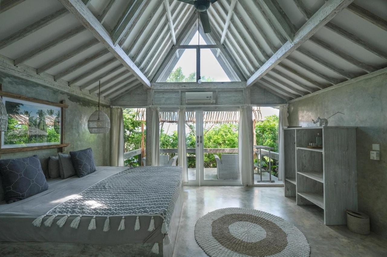 Salty Breeze Bali Hotel อูงาซัน ภายนอก รูปภาพ